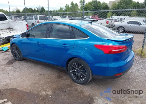 2015 Ford Focus Titanium from USA, damaged, VIN 1FADP3J27FL287249